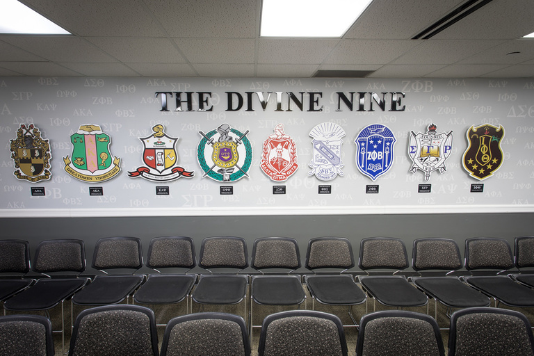 The Divine Nine wall display including nine logos. 
