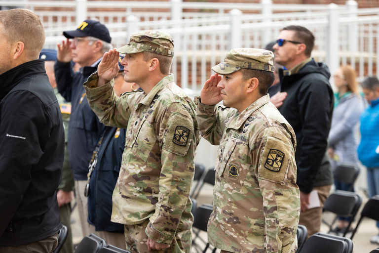 members of the armed forces at the IMU Veterans Plaza.