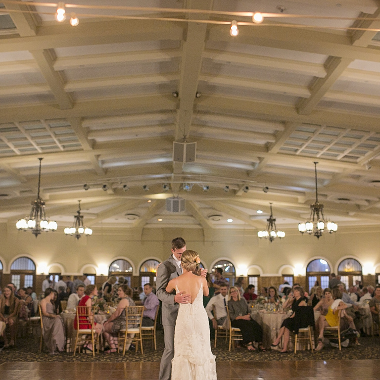 bride and groom dancing in the imu main lounge