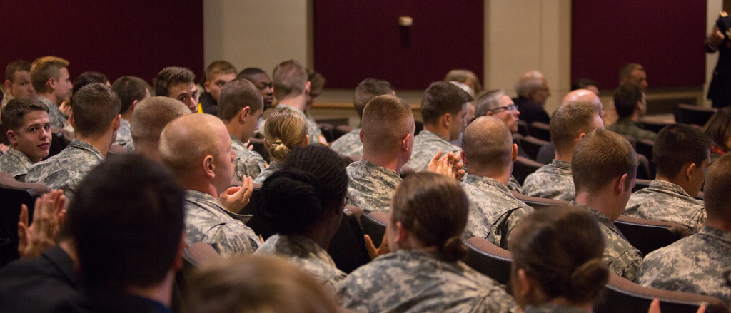 military veterans sitting in theatre