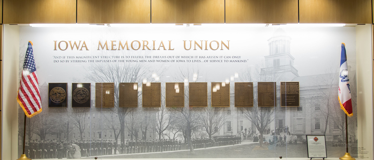 military plaques hanging in the iowa memorial union