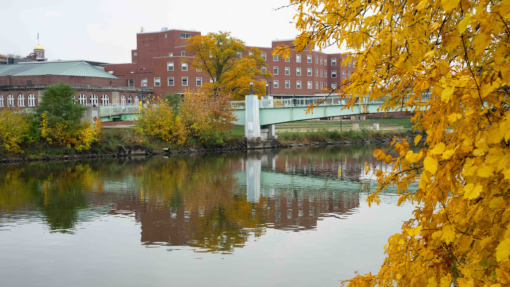 Image of the IMU alongside the river and golden fall leaves