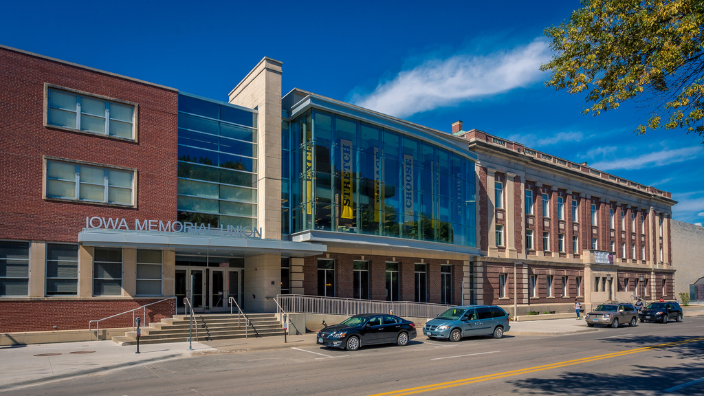 exterior shot of the IMU building in front of a clear sky