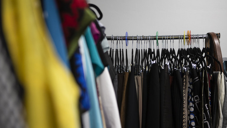 clothing hanging on racks