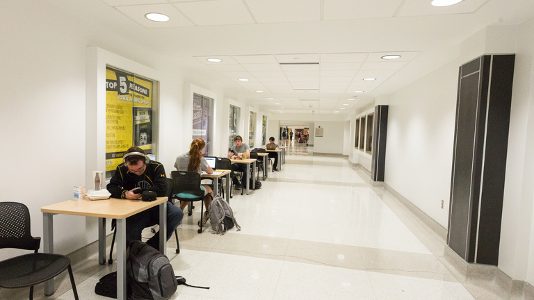 Students studying in the IMU ground floor main hallway